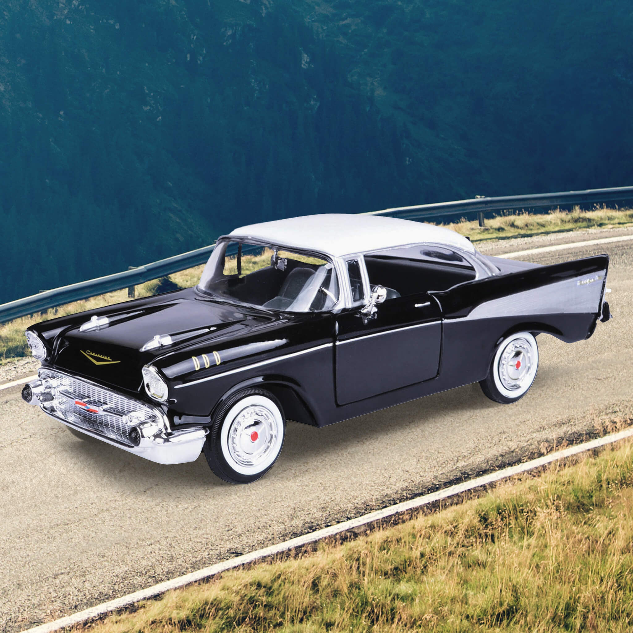 1957 Chevy Bel Air - Black parked on a winding mountain road showcasing classic chrome details, whitewall tires, and a two-tone black and white exterior.