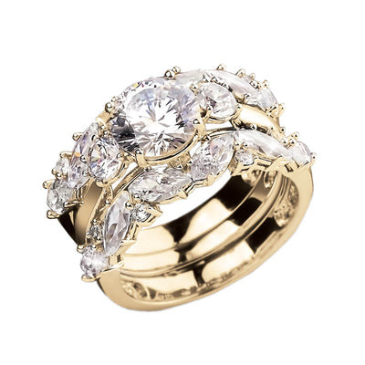 Savoy Bridal Ring in sterling silver with gold plating, featuring an intricate design adorned with clear sparkling gemstones, a luxurious female jewelry piece perfect for weddings.