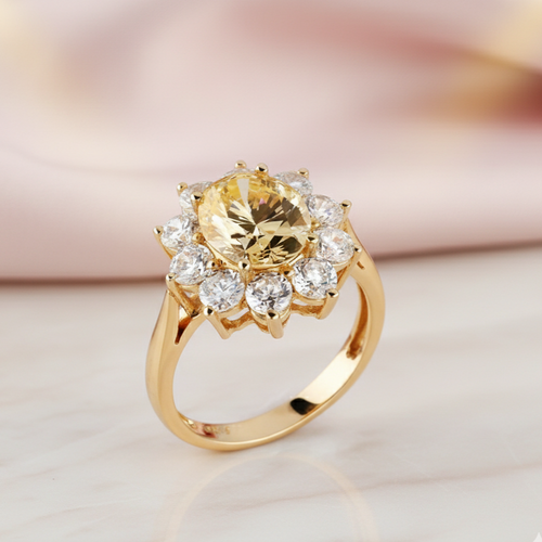 Gold ring with a large yellow gemstone and smaller clear stones on a light background