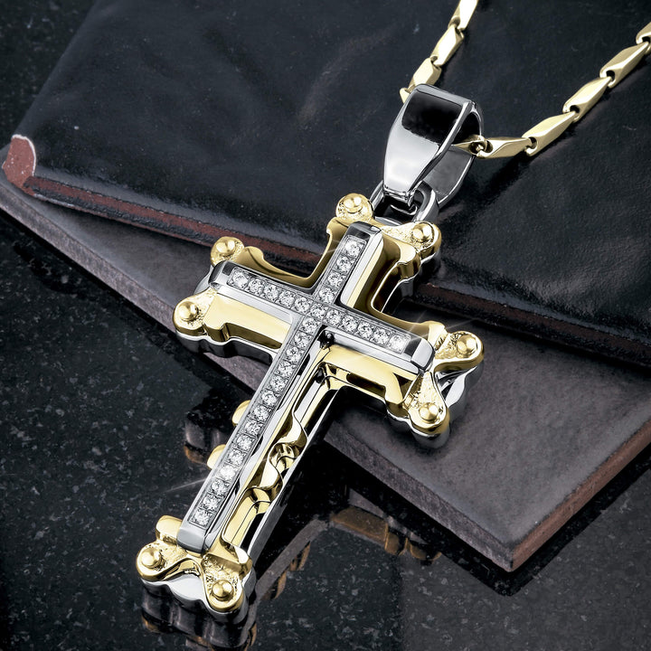 Goliath Steel Cross Pendant in two-tone stainless steel with a polished finish and embedded crystals, designed for men’s jewelry collections.