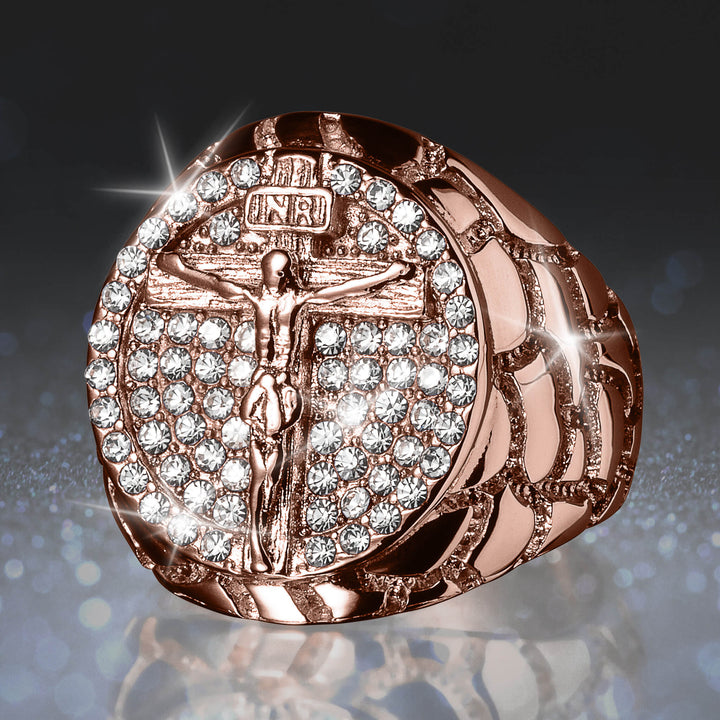 Holy Halo Men's Ring featuring a rose gold tone with a detailed crucifix design surrounded by sparkling clear stones on the face, combining religious symbolism with jewelry craftsmanship.