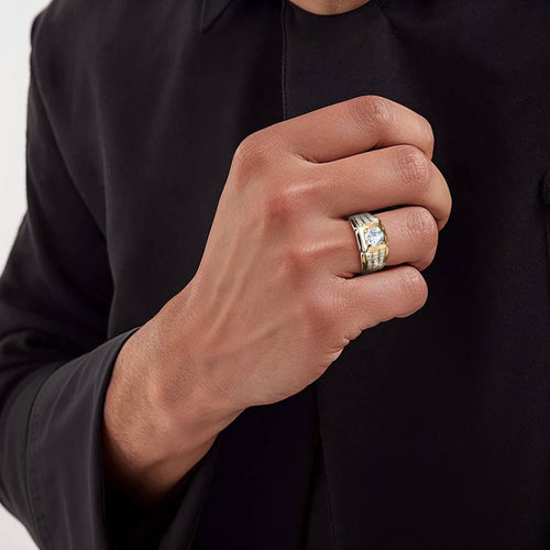 Male hand wearing Daniel Steiger Techmaster Gold Men&