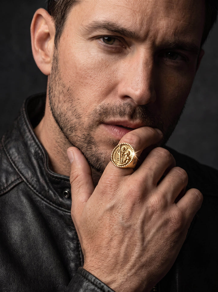 St. Christopher Ring with a gold religious medallion design worn by a man in a black leather jacket for a bold jewelry statement