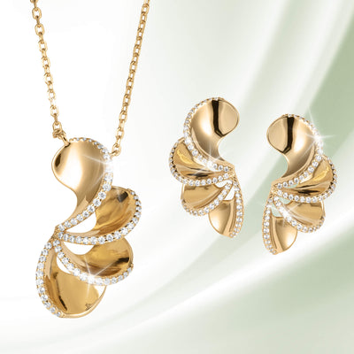 Elegant gold-tone pendant necklace and matching earrings with sparkling crystal accents from the Arianna Collection, available Up To 75% Off Retail.