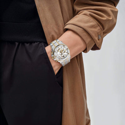 Phantom Two-Tone Men's Watch with stainless steel two-tone plating and silver dial worn on wrist paired with stylish outfit, showcasing contemporary men's luxury jewelry.
