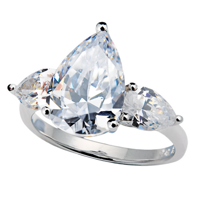 Pear Drop Ring crafted in sterling silver featuring a large pear-shaped central stone flanked by two smaller pear-cut stones, designed for female jewelry enthusiasts.