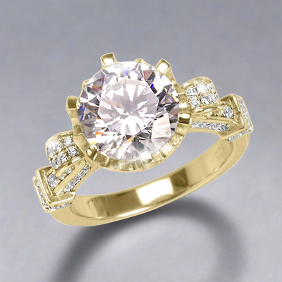 Baroque Ring featuring a large round center stone set in gold-plated sterling silver with intricate side detailing and small sparkling accent stones, designed for women’s jewelry.