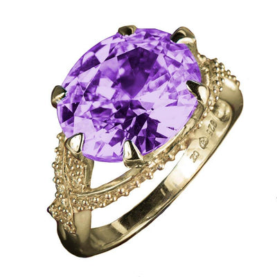 Flawless Thorn Gold Ring featuring a large oval purple gemstone set in gold-plated sterling silver with intricate thorn-inspired detailing, designed for women’s jewelry.
