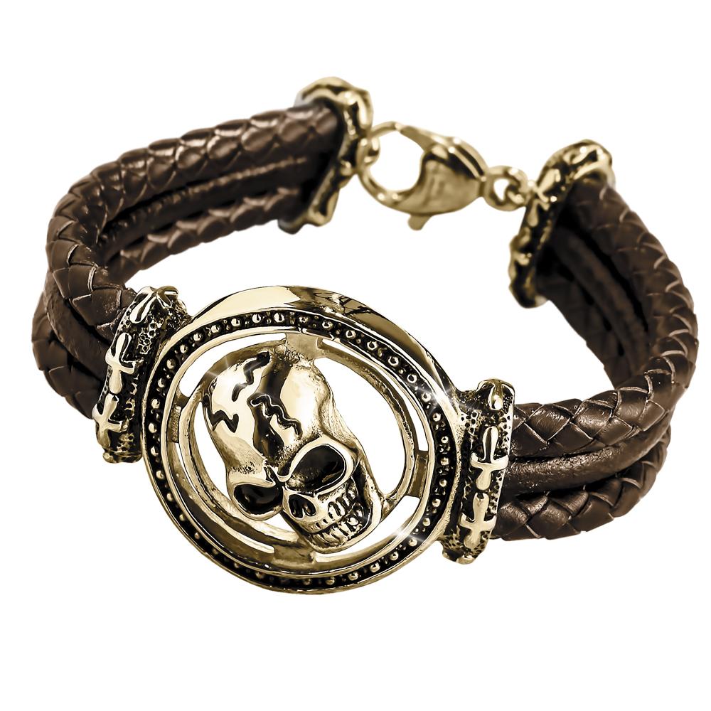 Skull Arena Gold Bracelet featuring a stainless steel gold-plated skull centerpiece on a braided brown leather band, designed for men’s jewelry collections.