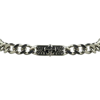 Fiorino Steel Bracelet featuring a stainless steel chain with a polished finish and a central decorative plate showcasing intricate engraving for a bold male jewelry accessory.