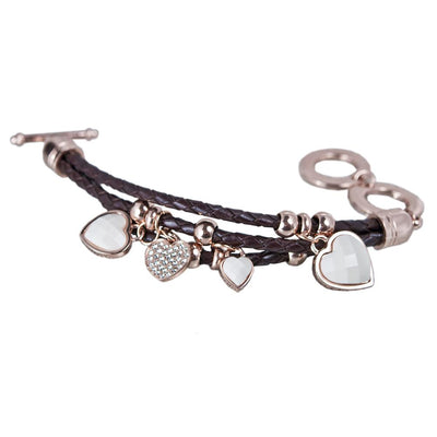 Silhouette Brown Leather Bracelet featuring braided leather strands with rose gold accents and heart-shaped charms, designed for a stylish female jewelry collection.