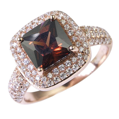 Pave Riviera Ring featuring a large square-cut gemstone surrounded by pavé-set stones on a sterling silver band plated in rose gold, designed for women’s jewelry collections.