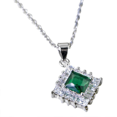 Gatsby Pendant featuring a sterling silver rhodium-plated chain with a square green gemstone surrounded by clear baguette-cut crystals, designed for women’s jewelry.