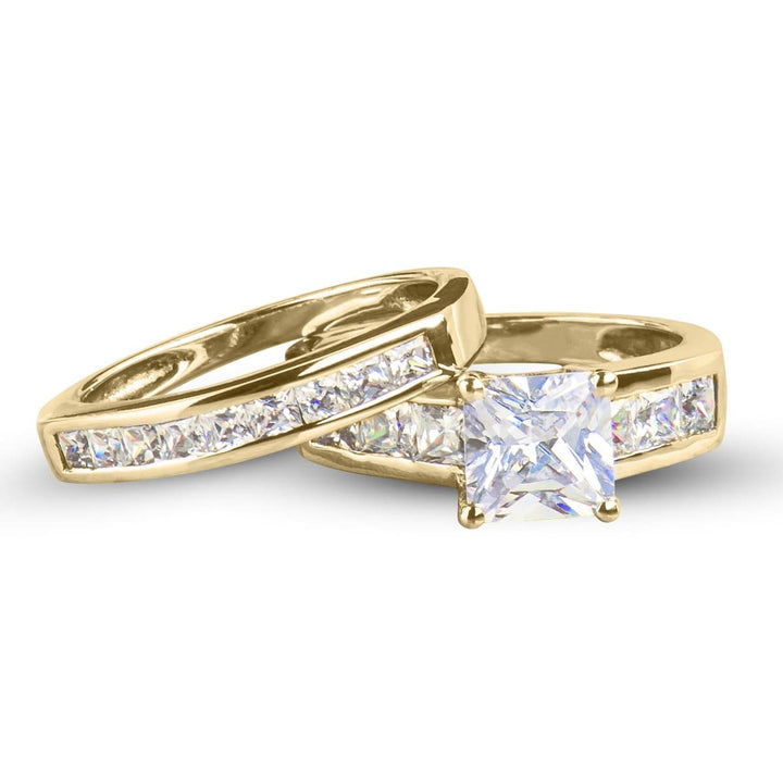 Lanai Duo Bridal Ring set in sterling silver with gold plating, featuring a princess-cut center stone and channel-set square accent stones, designed for women.