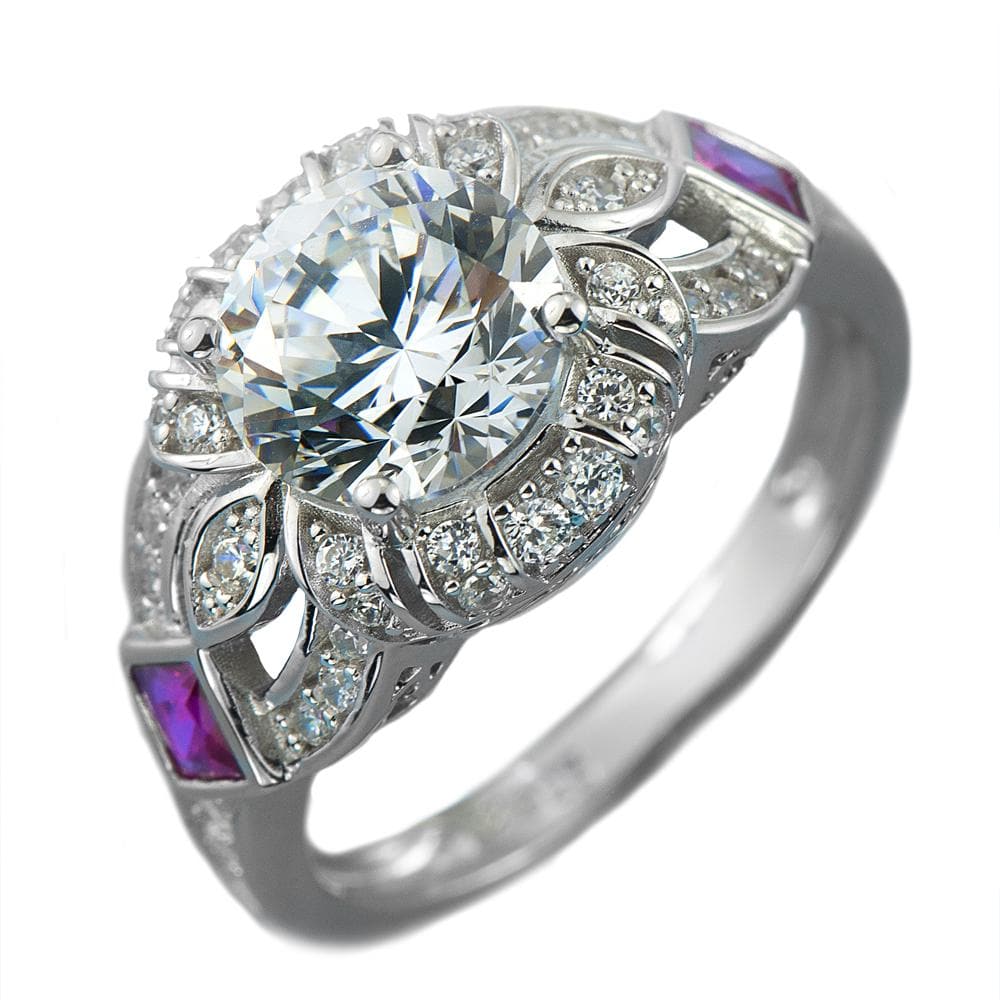 Heirloom Ring featuring a large round clear gemstone centerpiece set in sterling silver with rhodium plating, accented by smaller clear stones and two purple gemstones, designed for women.