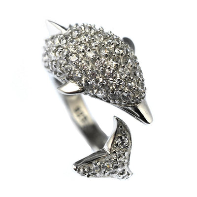 Dolphin Ring crafted in sterling silver with rhodium plating, featuring a dolphin design embellished with small sparkling stones, designed for women’s fine jewelry.