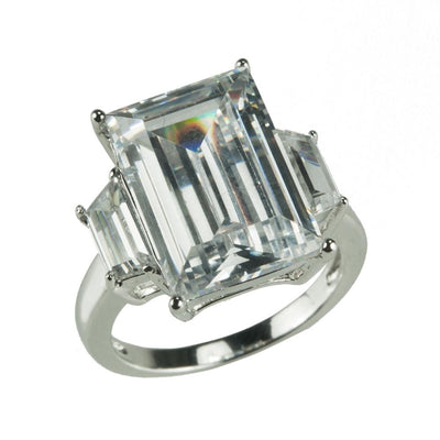 Sterling silver Casino Ring with rhodium plating featuring a large rectangular clear gemstone flanked by two smaller rectangular stones, designed for female jewelry collectors.