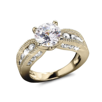Serena Gold Ring featuring a sterling silver base with elegant gold plating and a large central clear gemstone surrounded by smaller sparkling stones, designed for women’s jewelry.