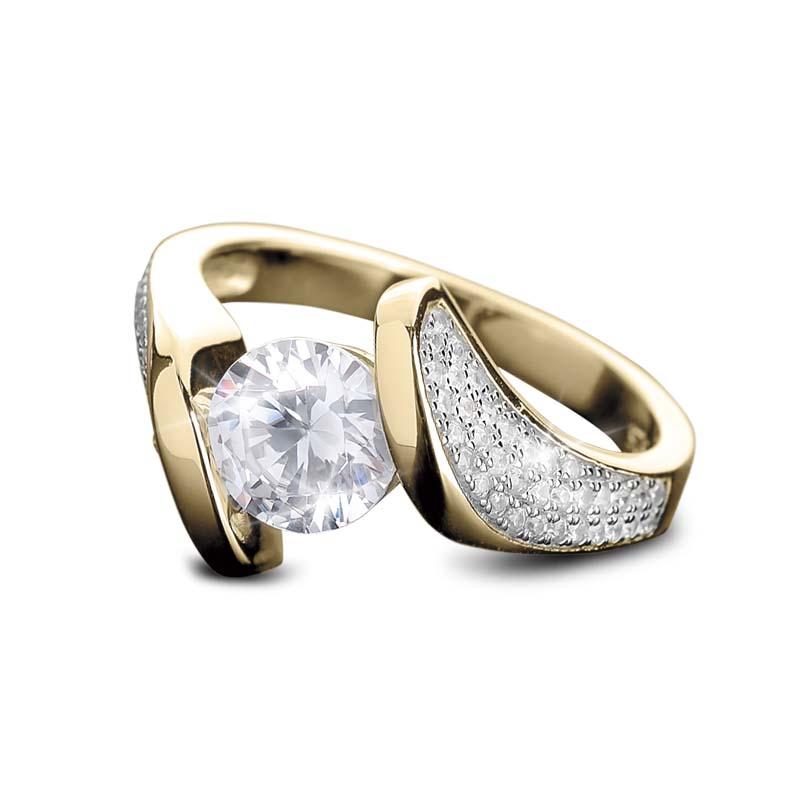 Regalia Twist Ring in sterling silver with gold plating, featuring a large central clear gemstone and pavé accents, designed for women’s elegant jewelry collection.