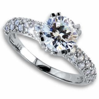 Sterling Silver Hoop Ring featuring a large central round-cut gemstone surrounded by smaller sparkling stones along the band, designed for female jewelry enthusiasts.