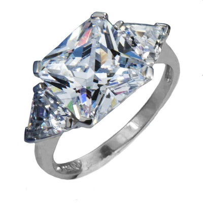 Close-up of the Legend Ring for female, crafted in sterling silver with rhodium plating, featuring a large central square-cut gemstone flanked by two smaller triangular stones.
