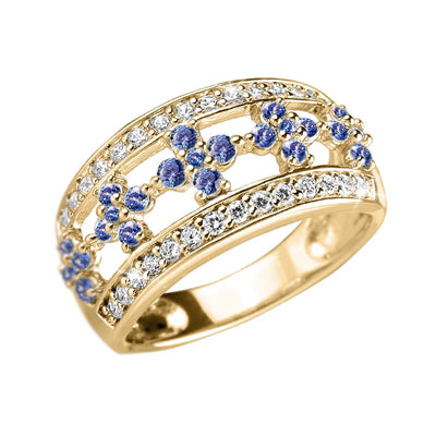 Ladies Gina Ring featuring sterling silver with gold plating, adorned with sparkling clear and vivid blue gemstones in an elegant design.