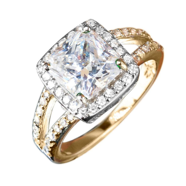 Madison Ring featuring a gold-plated sterling silver band with a large square-cut central stone surrounded by smaller sparkling stones, designed for women’s jewelry.