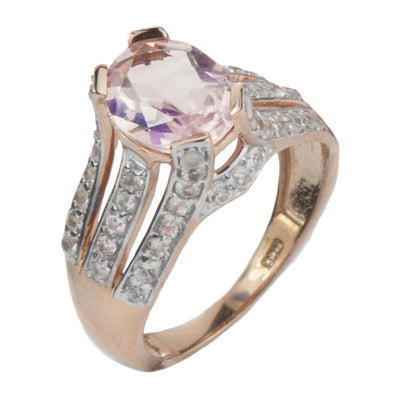 Blush Rose Ring featuring a rose gold plated sterling silver band adorned with sparkling clear stones and a large oval blush rose centerpiece gemstone.