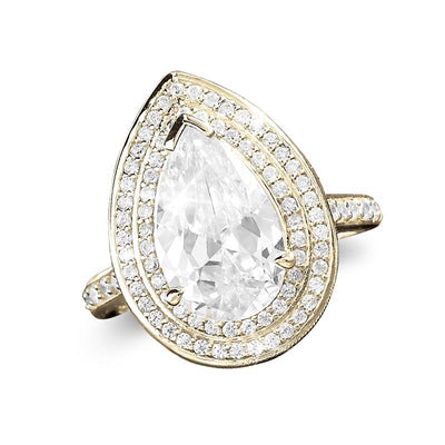 Pasha Pearshape Ring featuring a sterling silver band with gold plating, adorned with a large pear-shaped clear gemstone surrounded by two rows of smaller sparkling stones, designed for women.