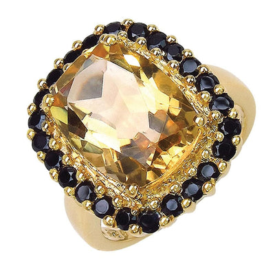 Sunflower Ring featuring a large faceted golden gemstone surrounded by black stones on a gold-plated sterling silver band designed for women’s jewelry.