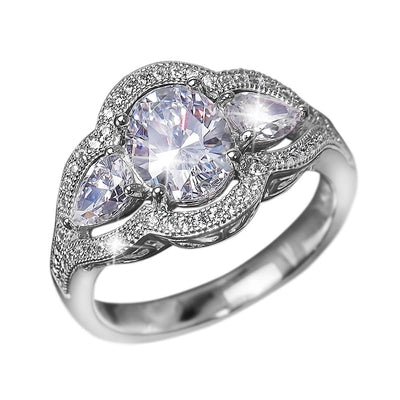 Bellissima Ring featuring a sterling silver band with rhodium plating, showcasing a large central sparkling gemstone flanked by two smaller pear-shaped stones and pavé accents.