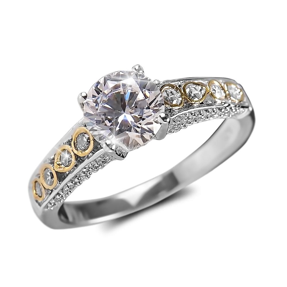 Romana Ring featuring two-tone sterling silver design with a large central gemstone and smaller diamond accents along the band, elegant jewelry for women.