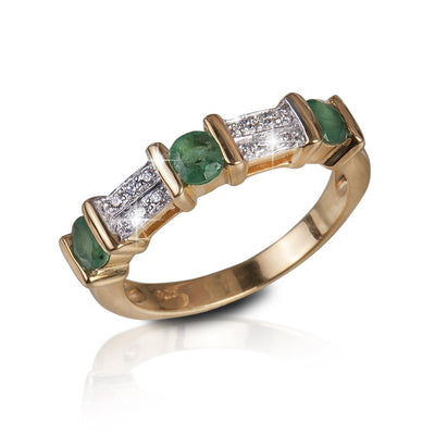 Trieste Emerald Gem Ring featuring sterling silver with gold plating, designed for female wearers, showcasing green emerald gems and sparkling accents in a sleek band style.